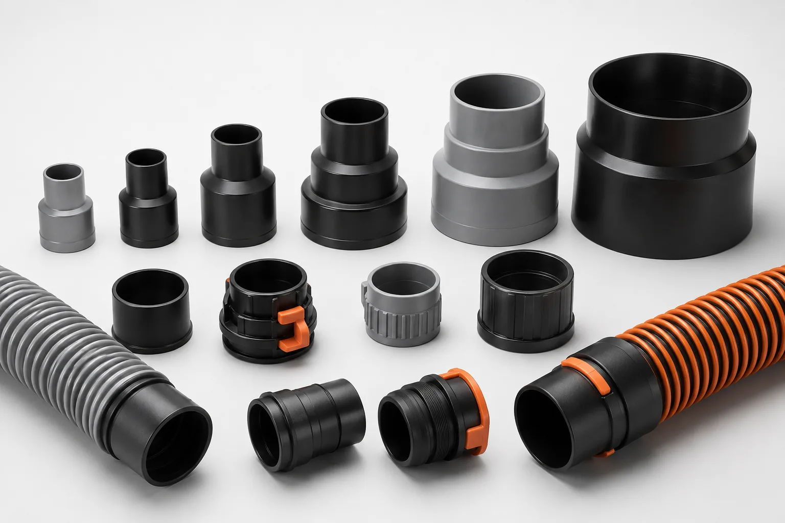 Assortment of dust-collection adapters, reducers and hoses.